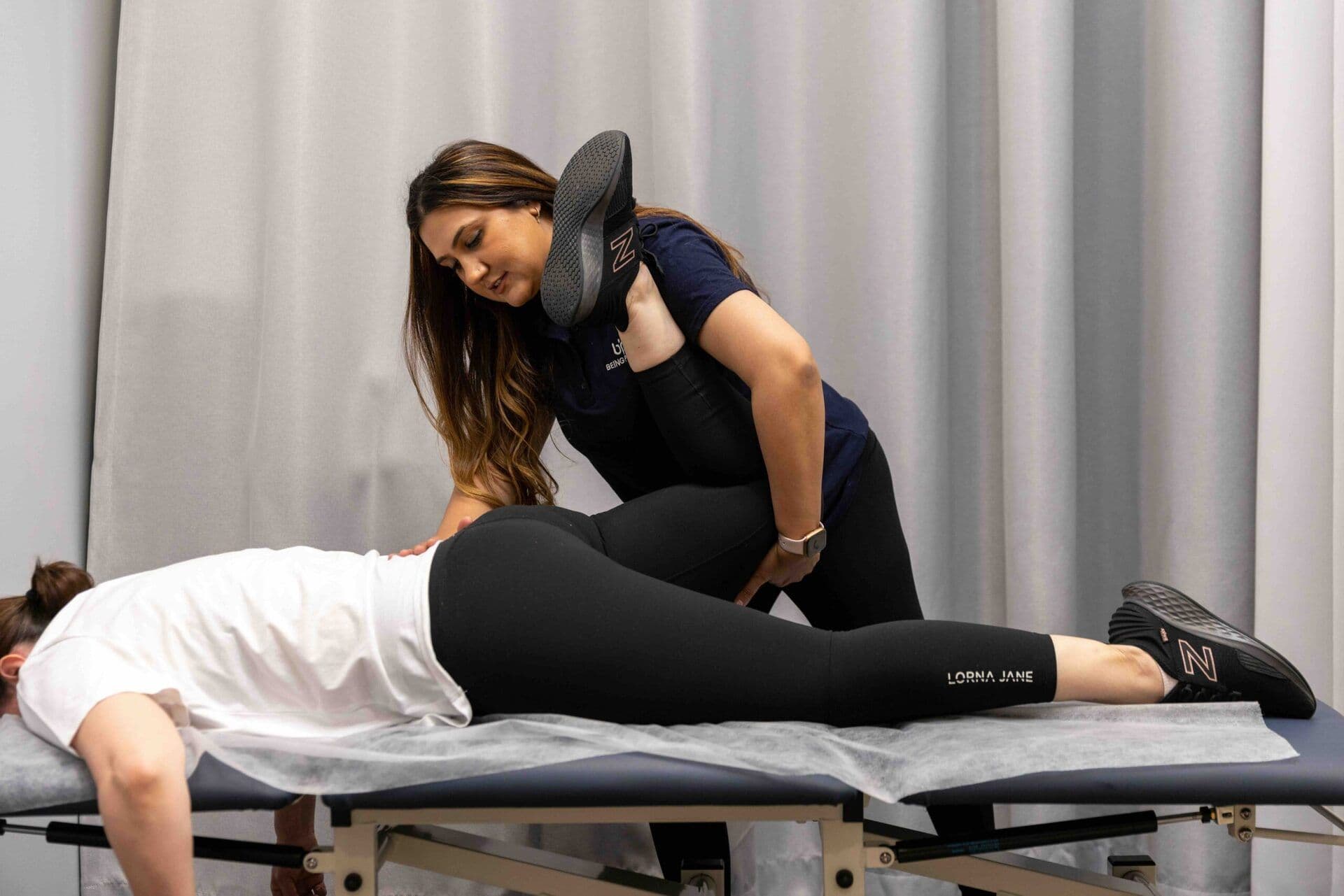 Physiotherapist working with a patient at Being Physio
